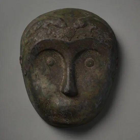 Repoussé metal mask - Indonesia,